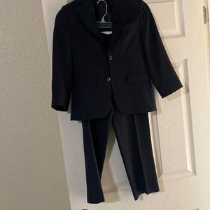 Boys black suit size 8. Worn only once to my brothers wedding. No Alterations
